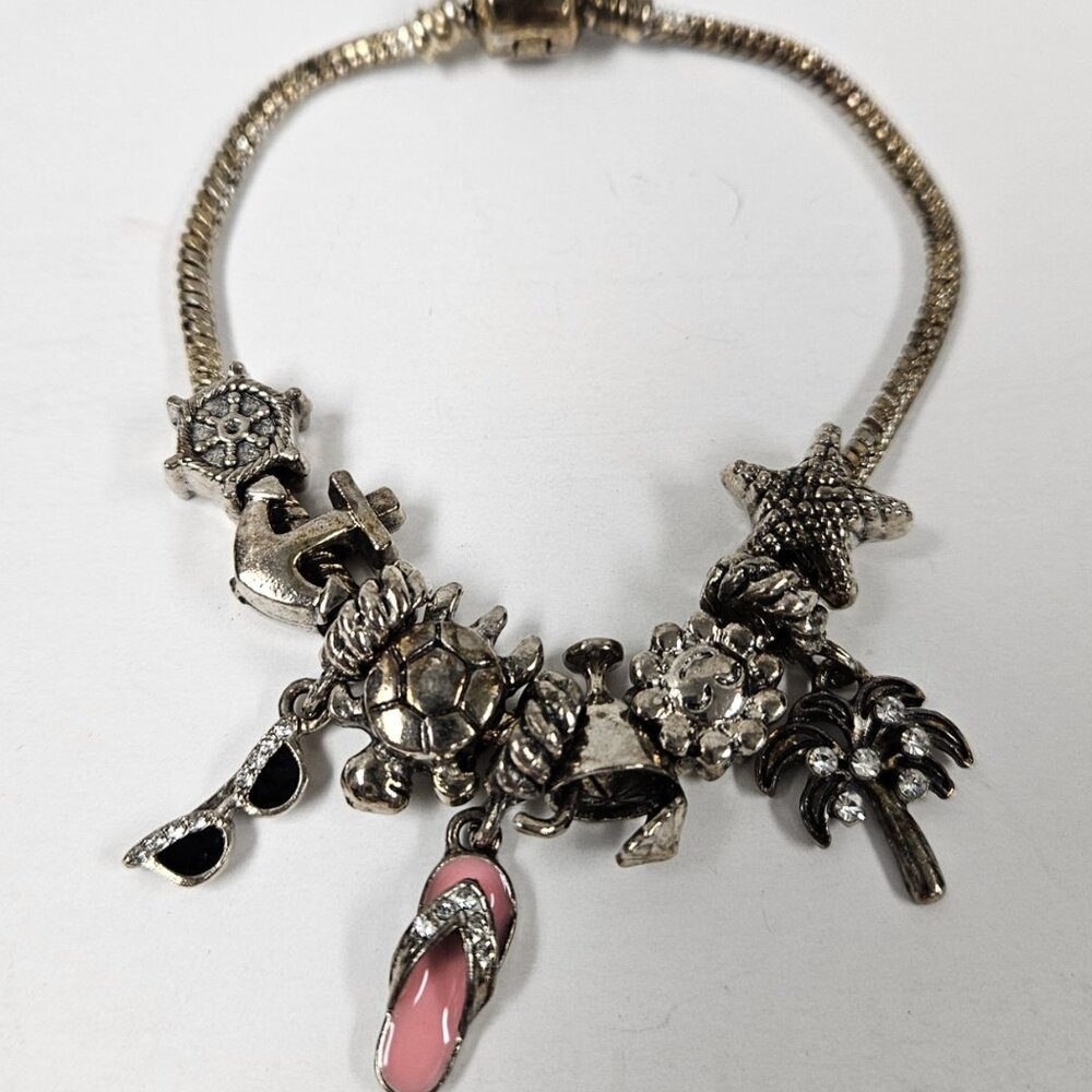 Silver Tone Random Theme Charm Bracelet with Hole Beads on a Snake Chain